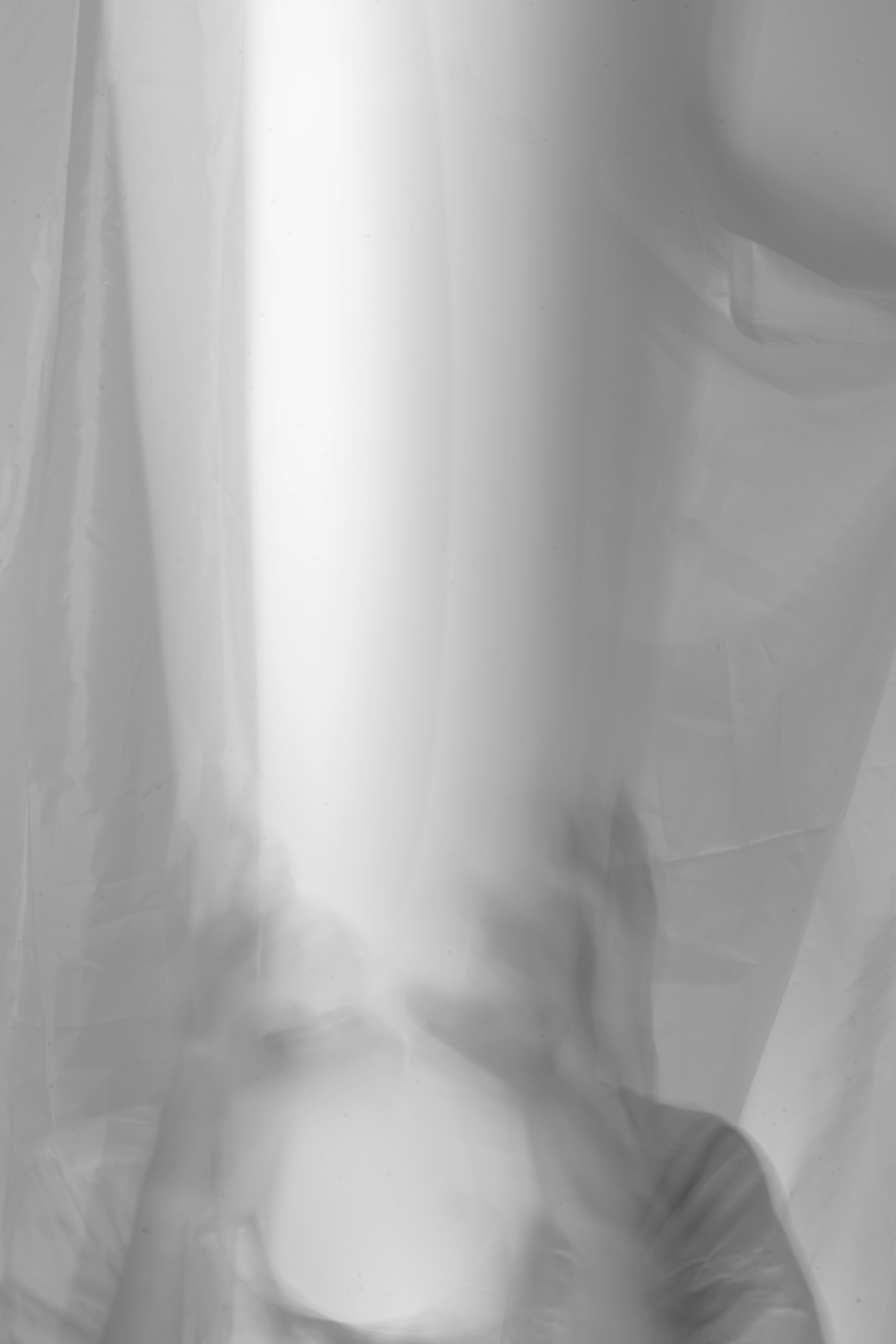 a blurry photo of a person holding a cell phone